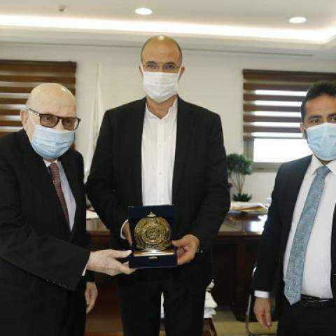 Hasan Receives a Memorial Shield from Abdul Rahman Solh in Recognition of his Humanitarian Role